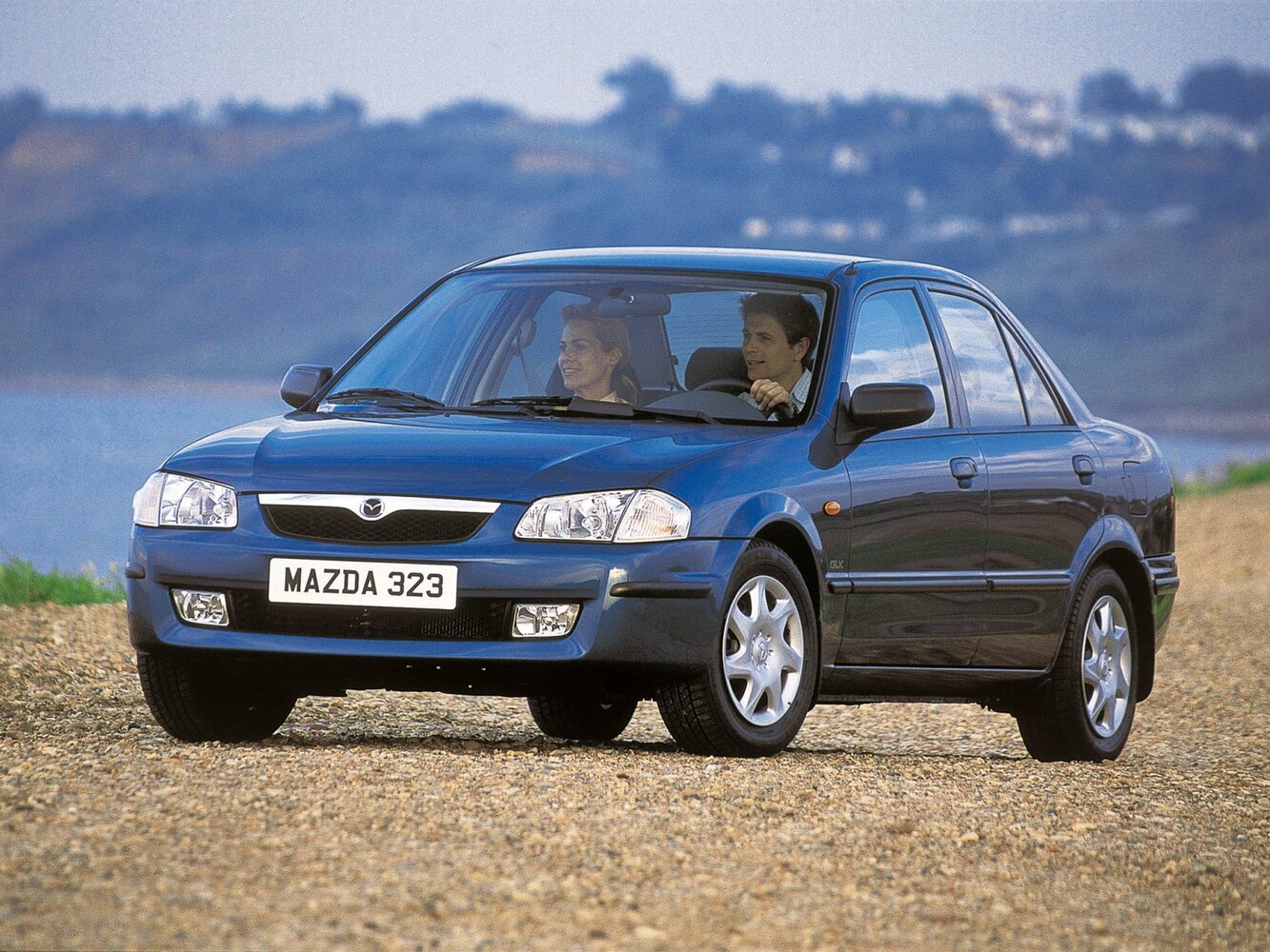 Mazda 323 VI (BJ), Седан: фото поколения