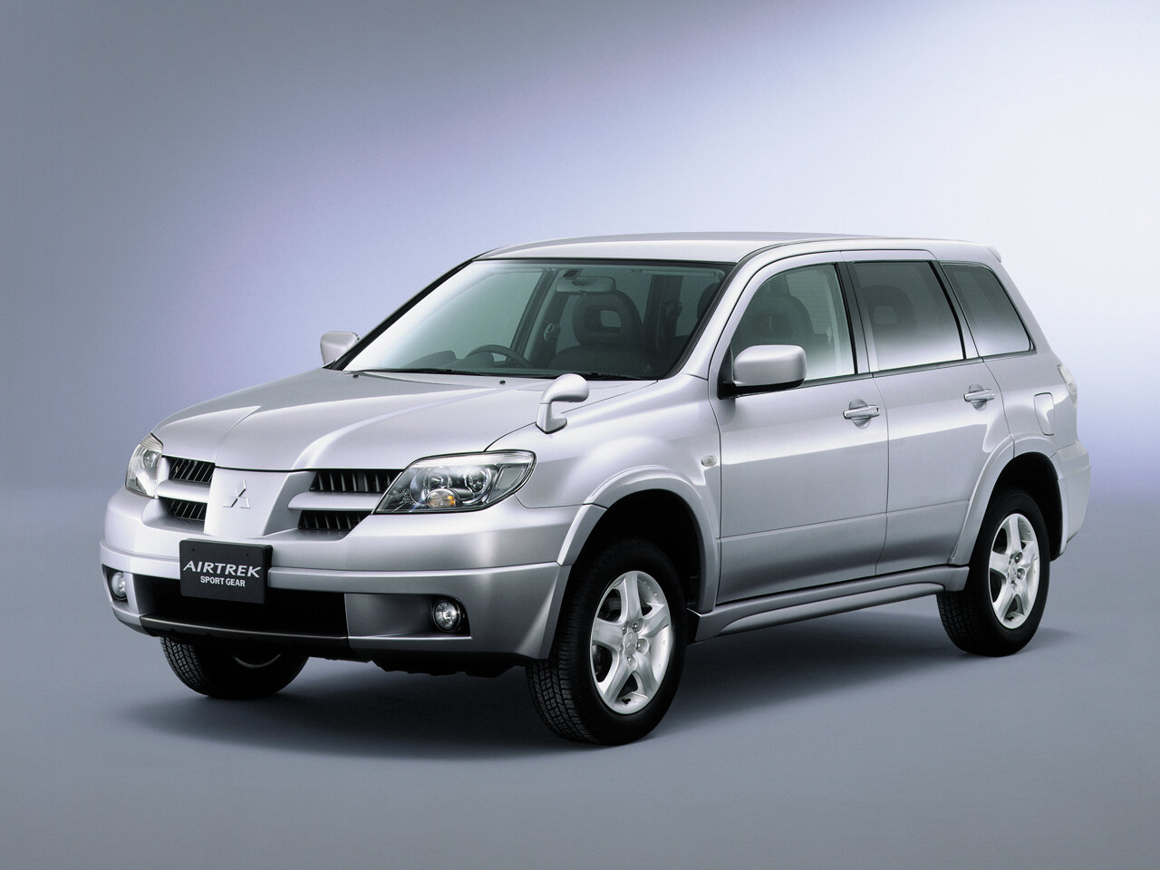 Mitsubishi Airtrek I Рестайлинг, вид сбоку
